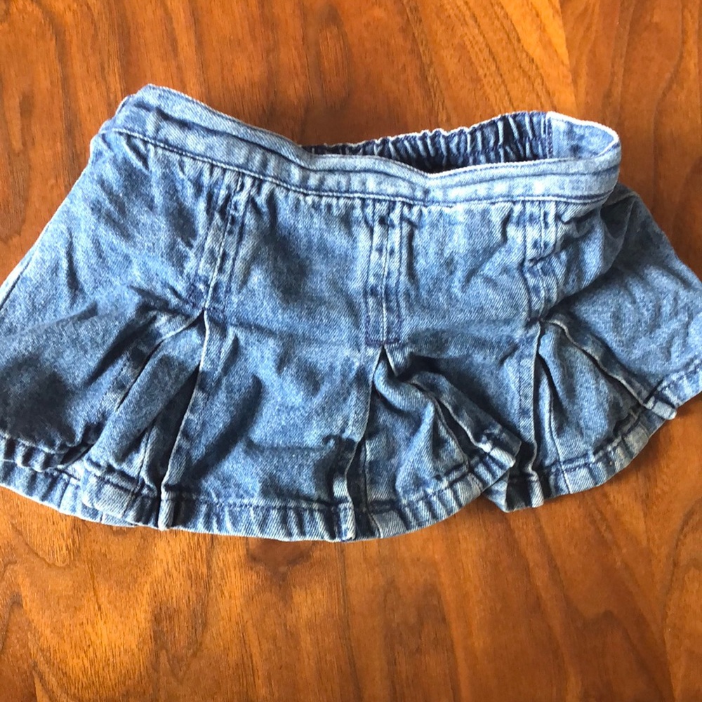 Pleated flared denim skirt
